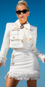 The Cream tweed two piece with bow and brooch