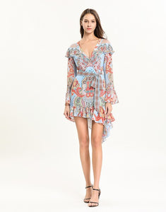 Light blue multi tile patterned mini dress with cut out shoulder.