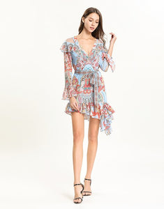 Light blue multi tile patterned mini dress with cut out shoulder.