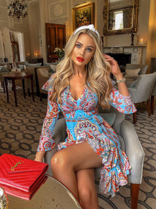 Light blue multi tile patterned mini dress with cut out shoulder.