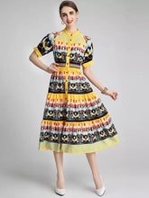 Load image into Gallery viewer, Bird and flower in rows midi dress