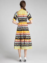 Load image into Gallery viewer, Bird and flower in rows midi dress