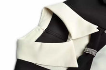 Load image into Gallery viewer, Black and white with bow details dress