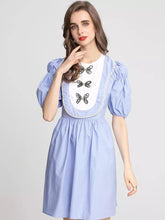 Load image into Gallery viewer, Butterfly and pearl oversized bib mini dress