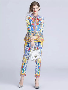 Exuberant pattern peplum top and trouser set