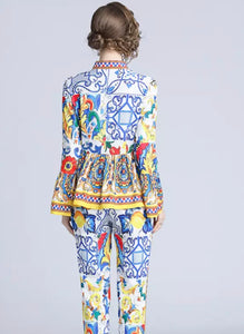 Exuberant pattern peplum top and trouser set