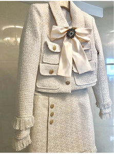 The Cream tweed two piece with bow and brooch