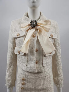 The Cream tweed two piece with bow and brooch – Comino Couture