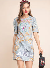 Load image into Gallery viewer, The dream house mini dress with beading on the front