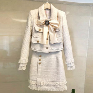 The Cream tweed two piece with bow and brooch