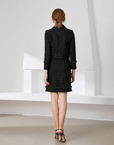 Black tweed two piece with bow and brooch