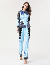 Load image into Gallery viewer, Light blue “All Hail” tropical leaf print two piece SAMPLE